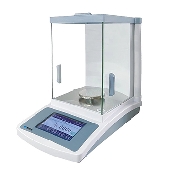 On what principle does an electronic balance work?